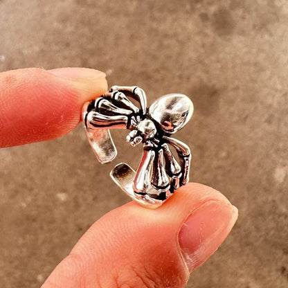 Men's ring with adjustable wide face opening