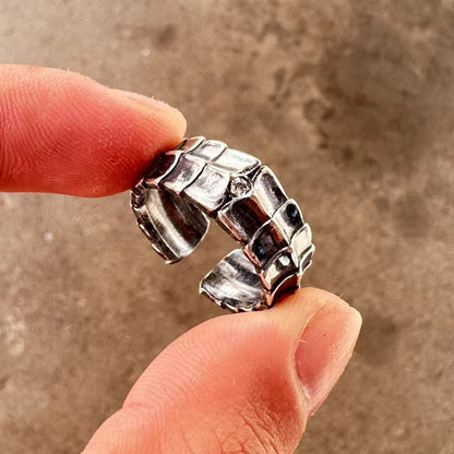 Men's ring with adjustable wide face opening